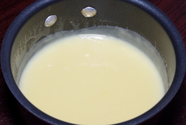 melted white chocolate ganache in a non-stick sauce pan
